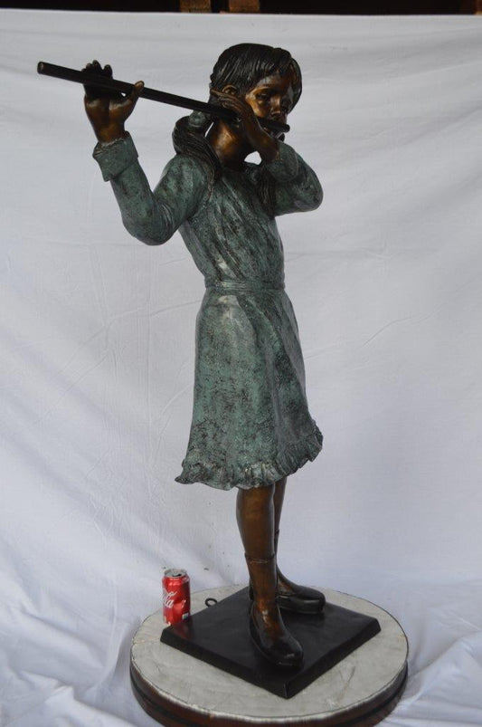 Girl playing flute large bronze statue -  Size: 30"L x 15"W x 50"H.