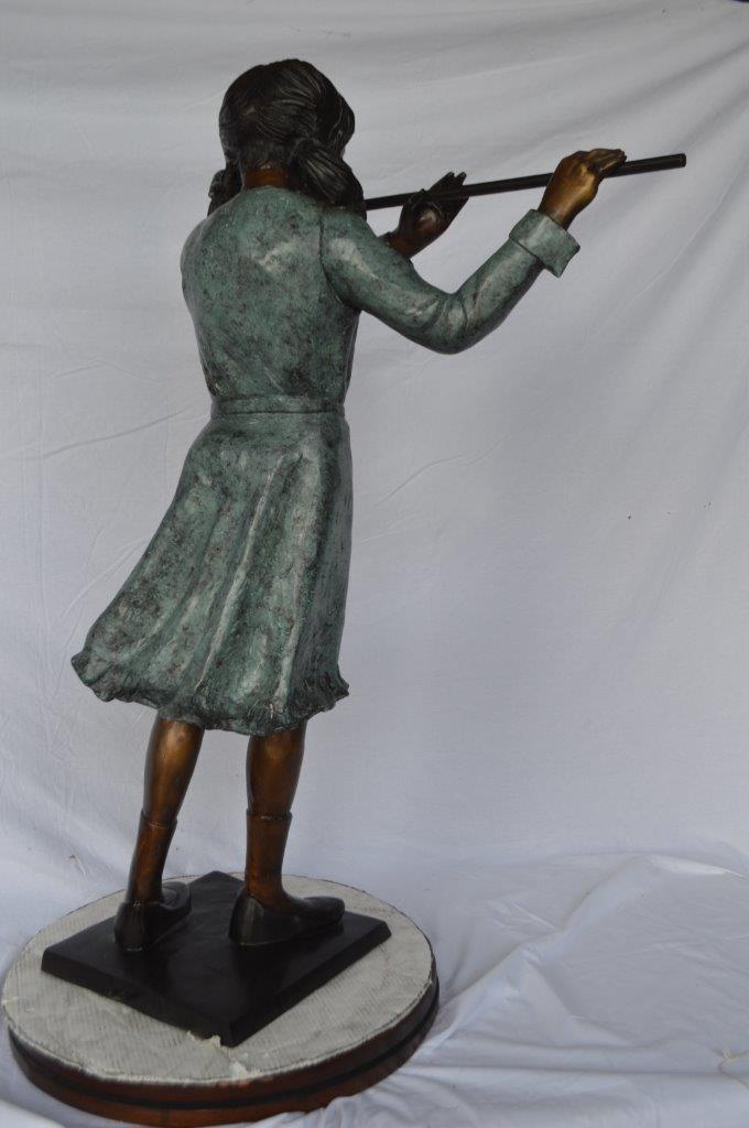 Girl playing flute large bronze statue - Size: 30"L x 15"W x 50"H.