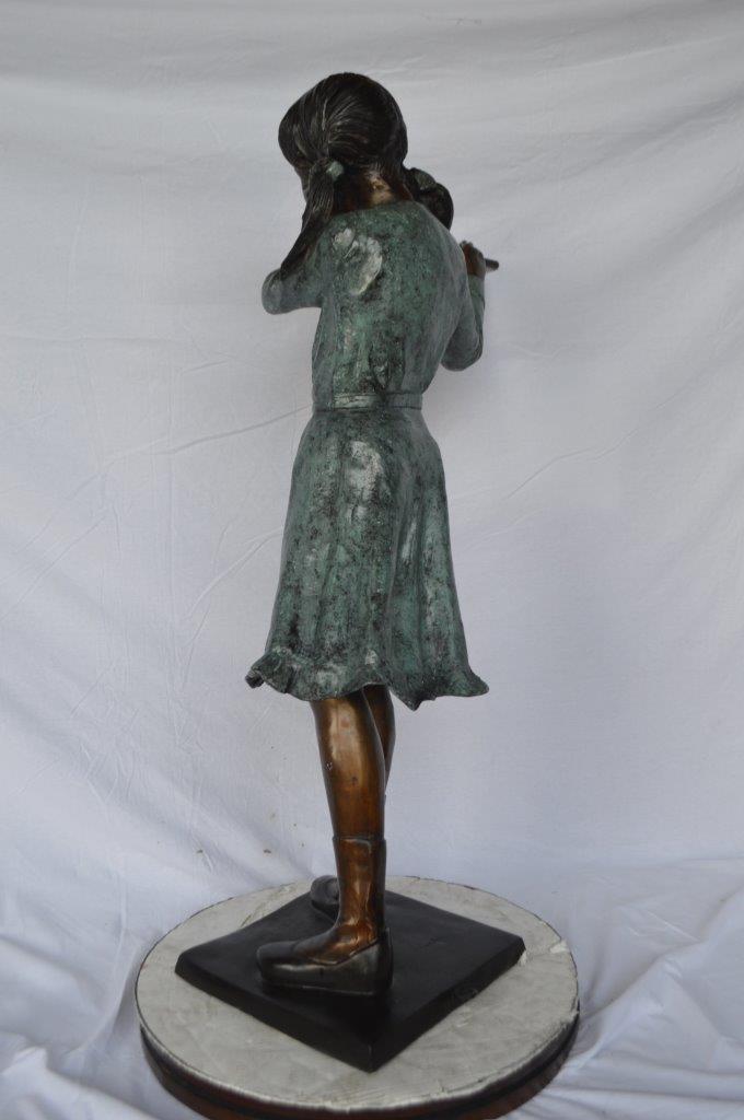 Girl playing flute large bronze statue - Size: 30"L x 15"W x 50"H.