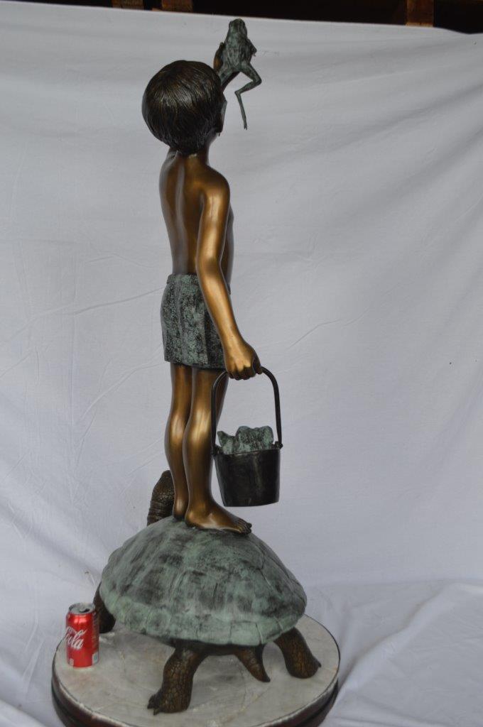 Boy on turtle holding frog bronze fountain statue - Size: 24"L x 18"W x 55"H.