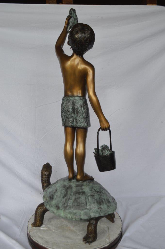 Boy on turtle holding frog bronze fountain statue - Size: 24"L x 18"W x 55"H.