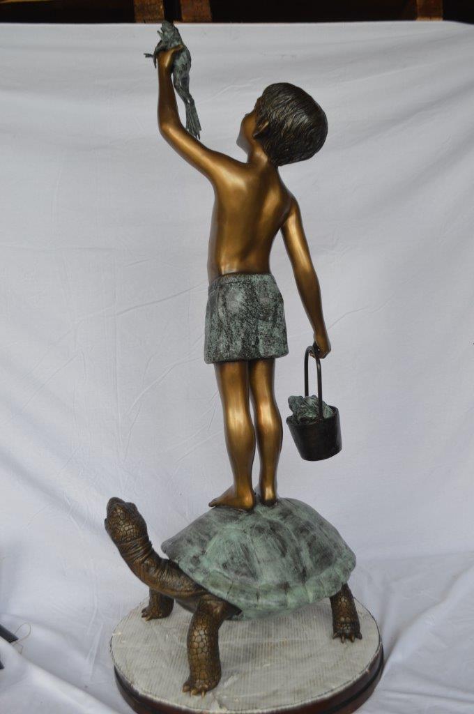 Boy on turtle holding frog bronze fountain statue -  Size: 24"L x 18"W x 55"H.
