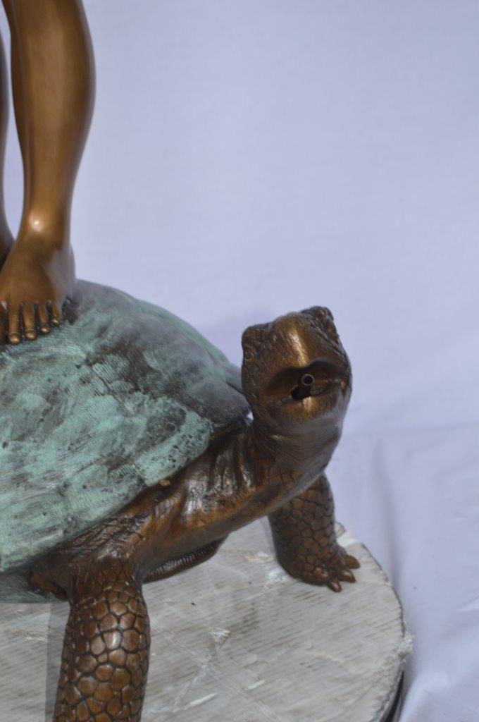 Boy on turtle holding frog bronze fountain statue - Size: 24"L x 18"W x 55"H.