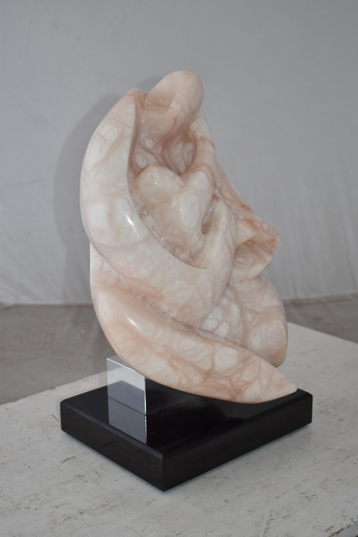 Mother and Child Marble Sculpture mounted on carousel base 12" x 11" x 19"H