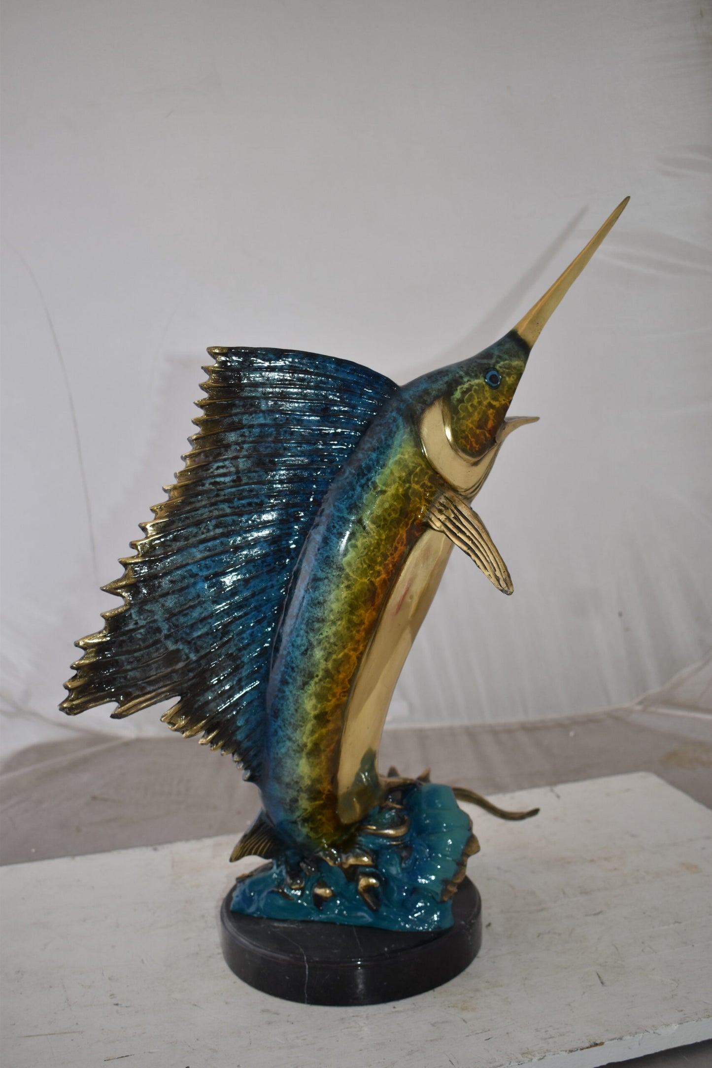 Gold And Blue Sailfish Swimming In Ocean Bronze Statue Size: 18" x 16" x 26"H