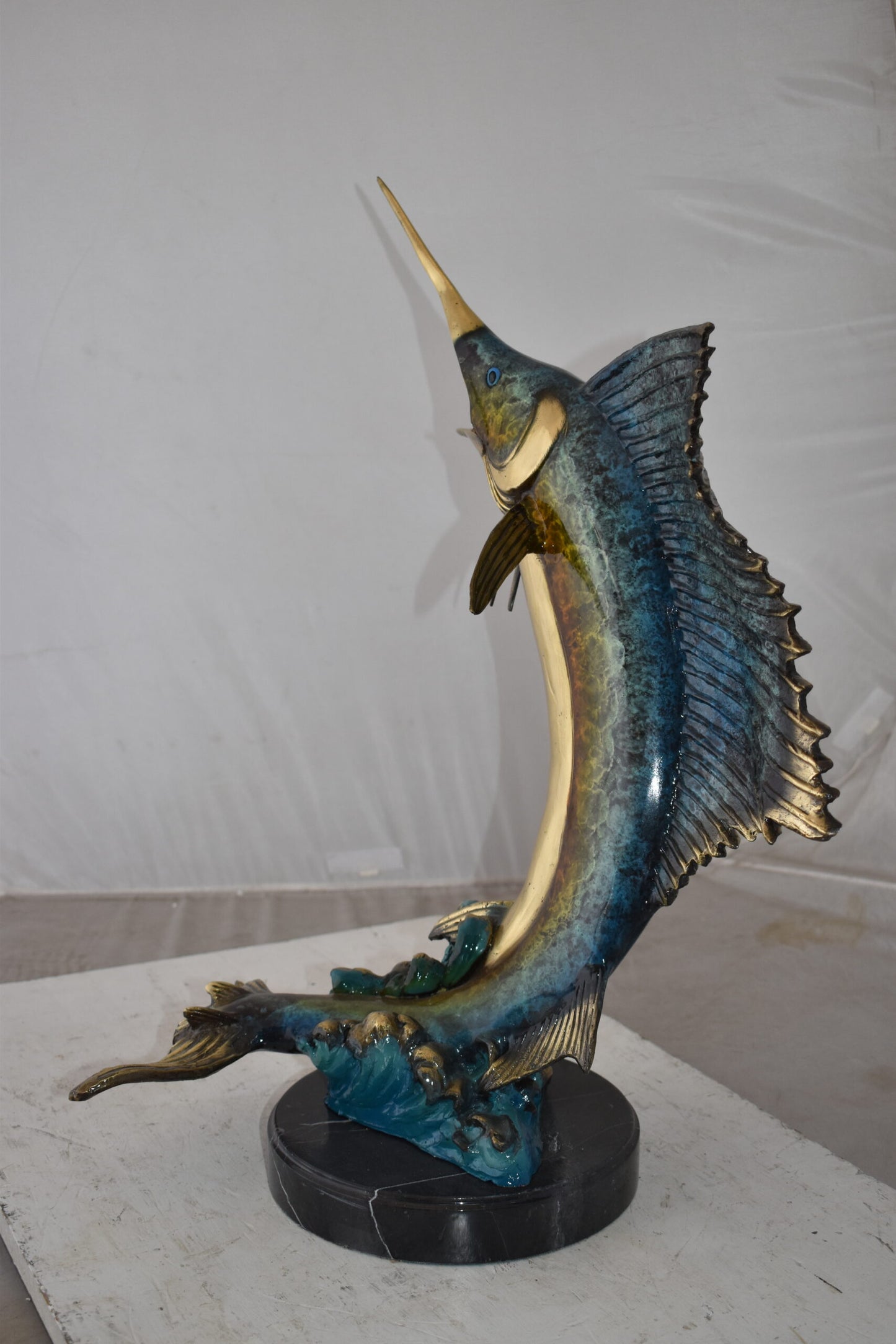Gold And Blue Sailfish Swimming In Ocean Bronze Statue Size: 18" x 16" x 26"H