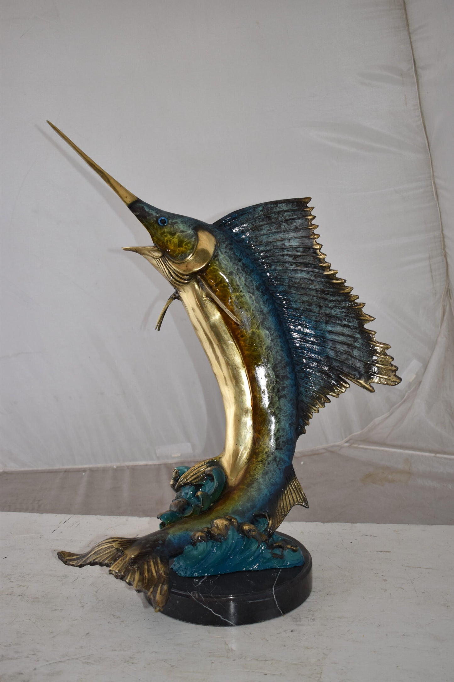 Gold And Blue Sailfish Swimming In Ocean Bronze Statue Size: 18" x 16" x 26"H