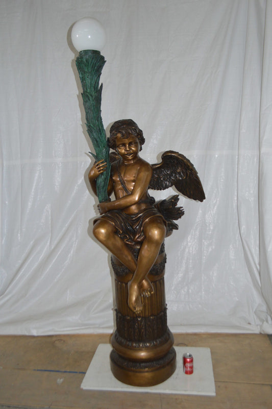 Pair of Cupid on stand lamp - Size: 28"L x 24"W x 90"H.