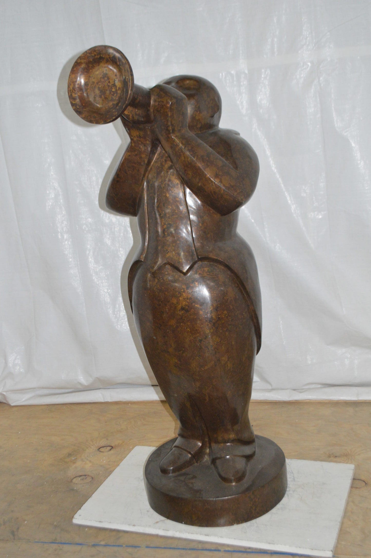 Musician playing the trumpet bronze statue - Size: 24"L x 20"W x 56"H.