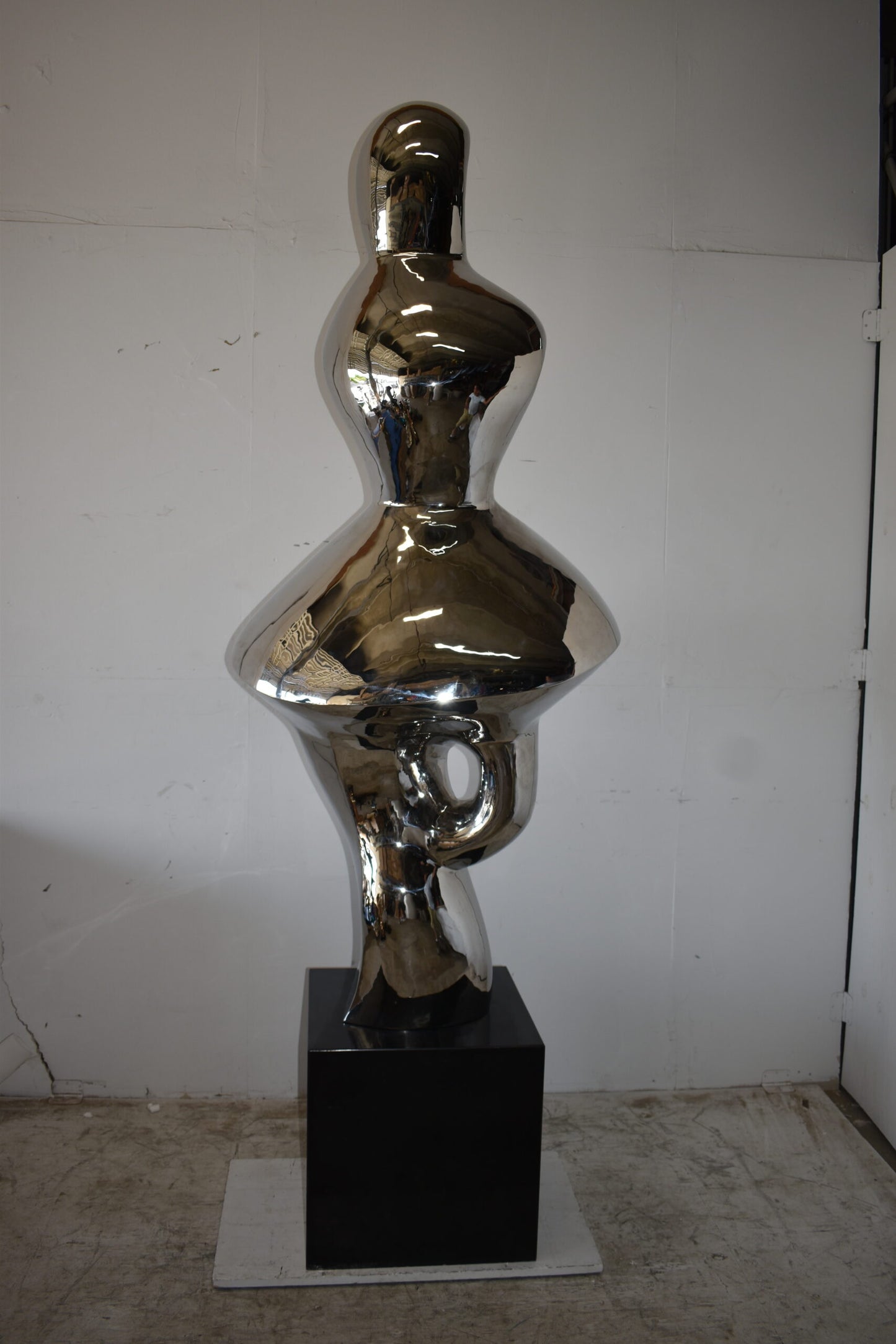 Ambiguous Stainless-Steel Statue On Marble Base Size: 28" x 28" x 100"H