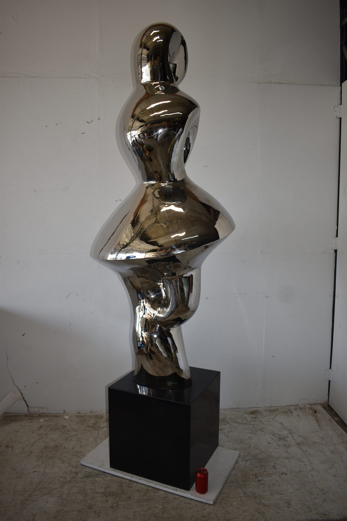 Ambiguous Stainless-Steel Statue On Marble Base Size: 28" x 28" x 100"H