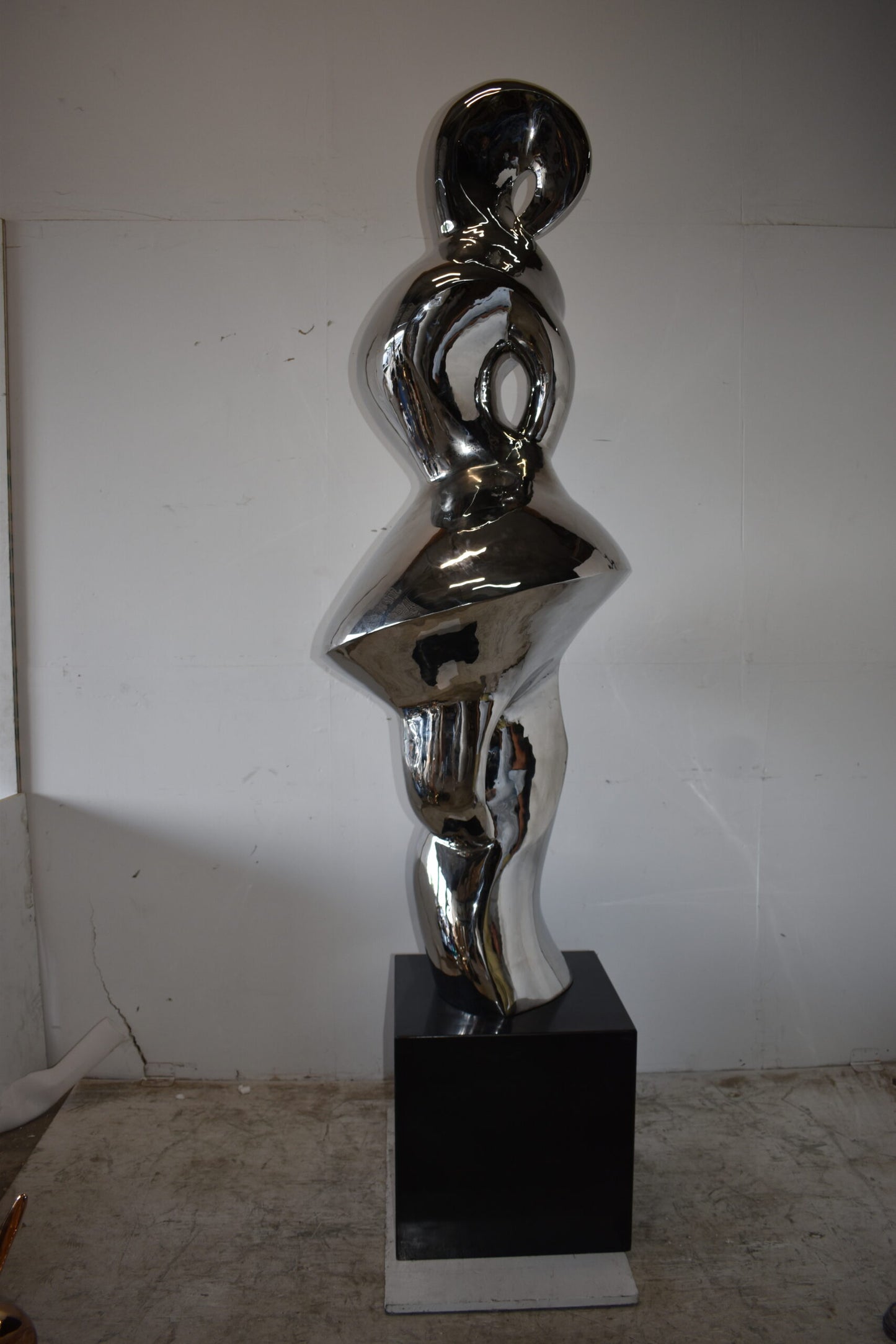Ambiguous Stainless-Steel Statue On Marble Base Size: 28" x 28" x 100"H