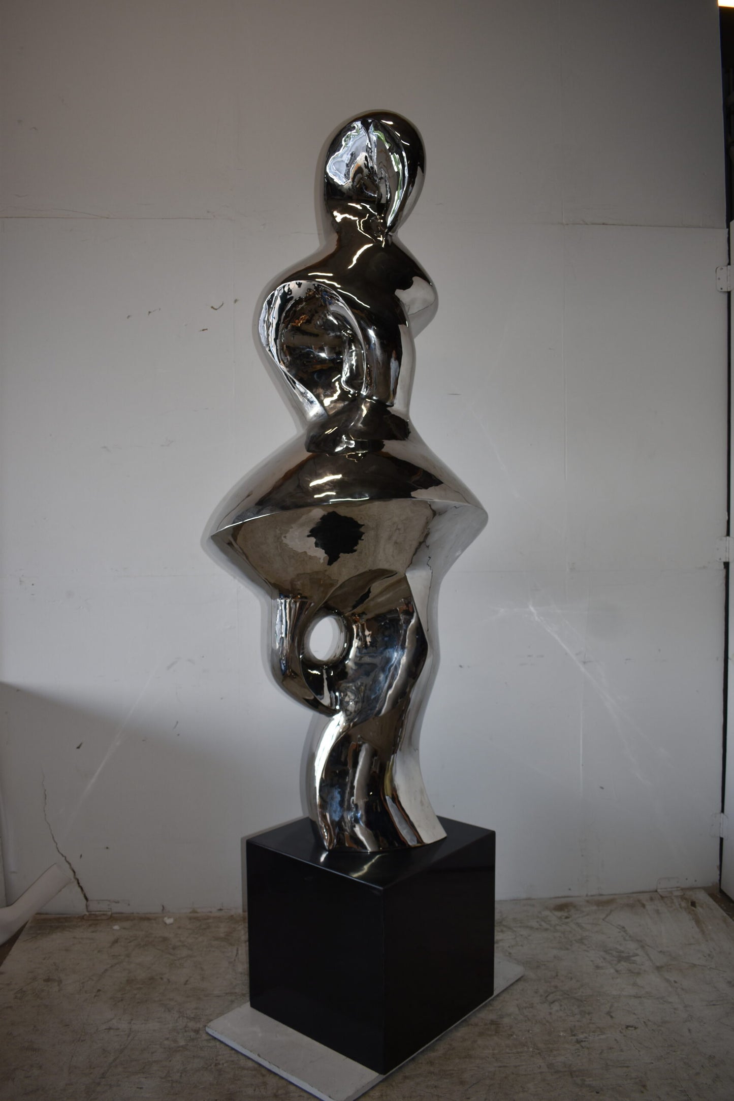 Ambiguous Stainless-Steel Statue On Marble Base Size: 28" x 28" x 100"H