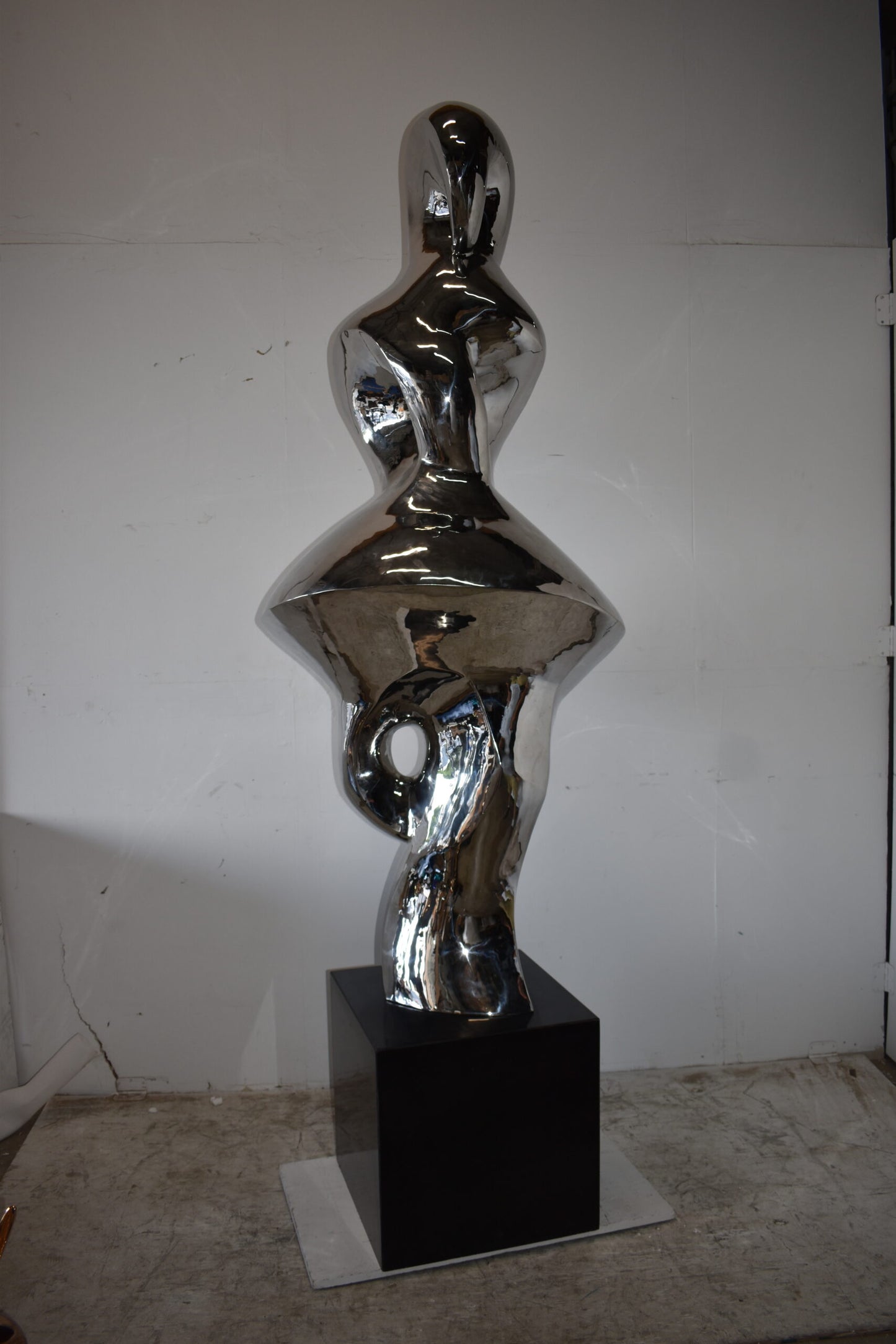 Ambiguous Stainless-Steel Statue On Marble Base Size: 28" x 28" x 100"H