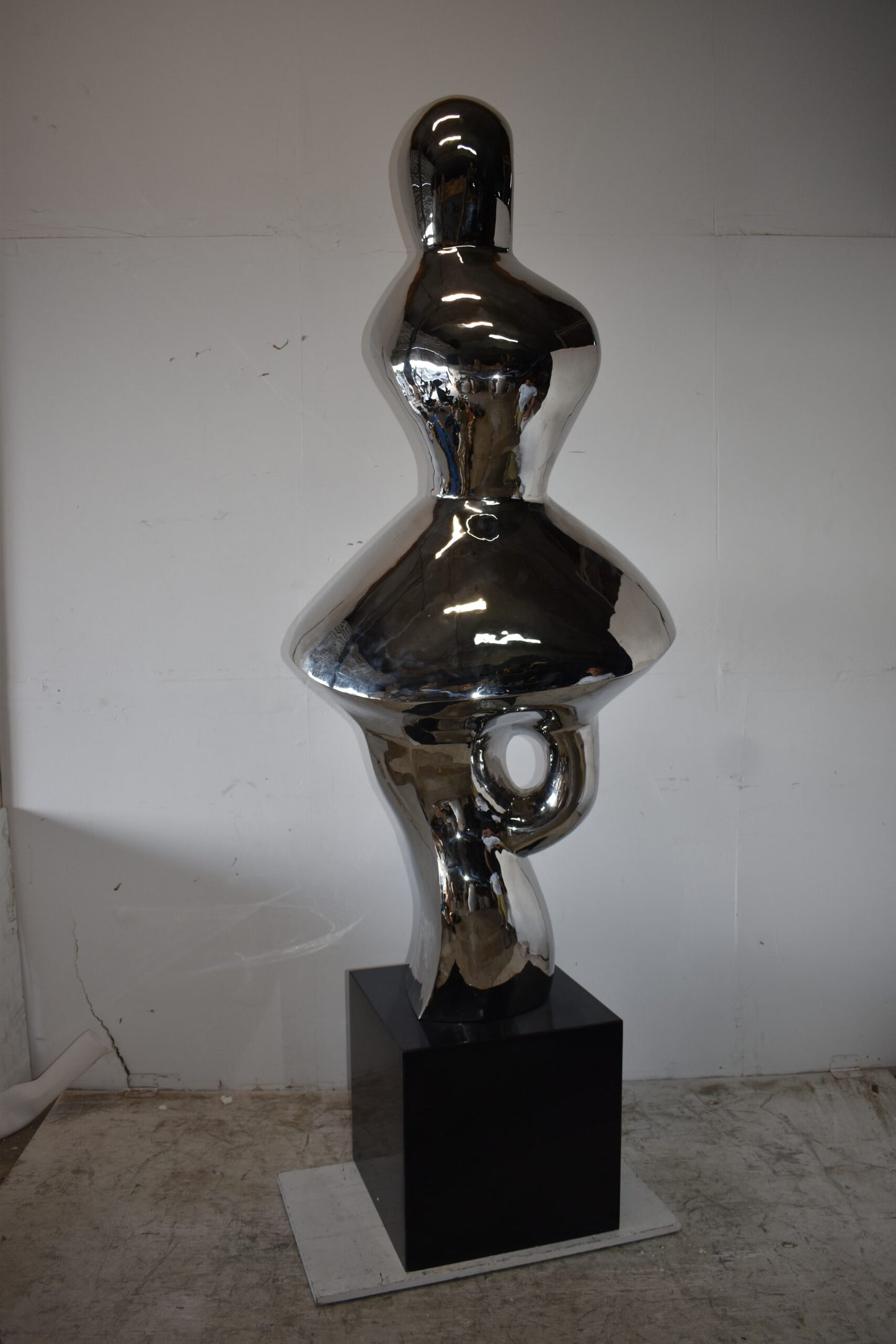 Ambiguous Stainless-Steel Statue On Marble Base Size: 28" x 28" x 100"H