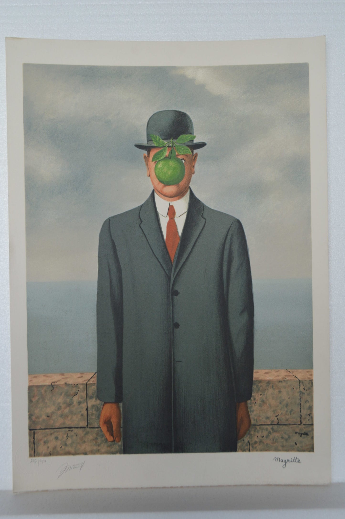 Son of Man by Magritte signed and sealed - Size: 14"L x 19"W