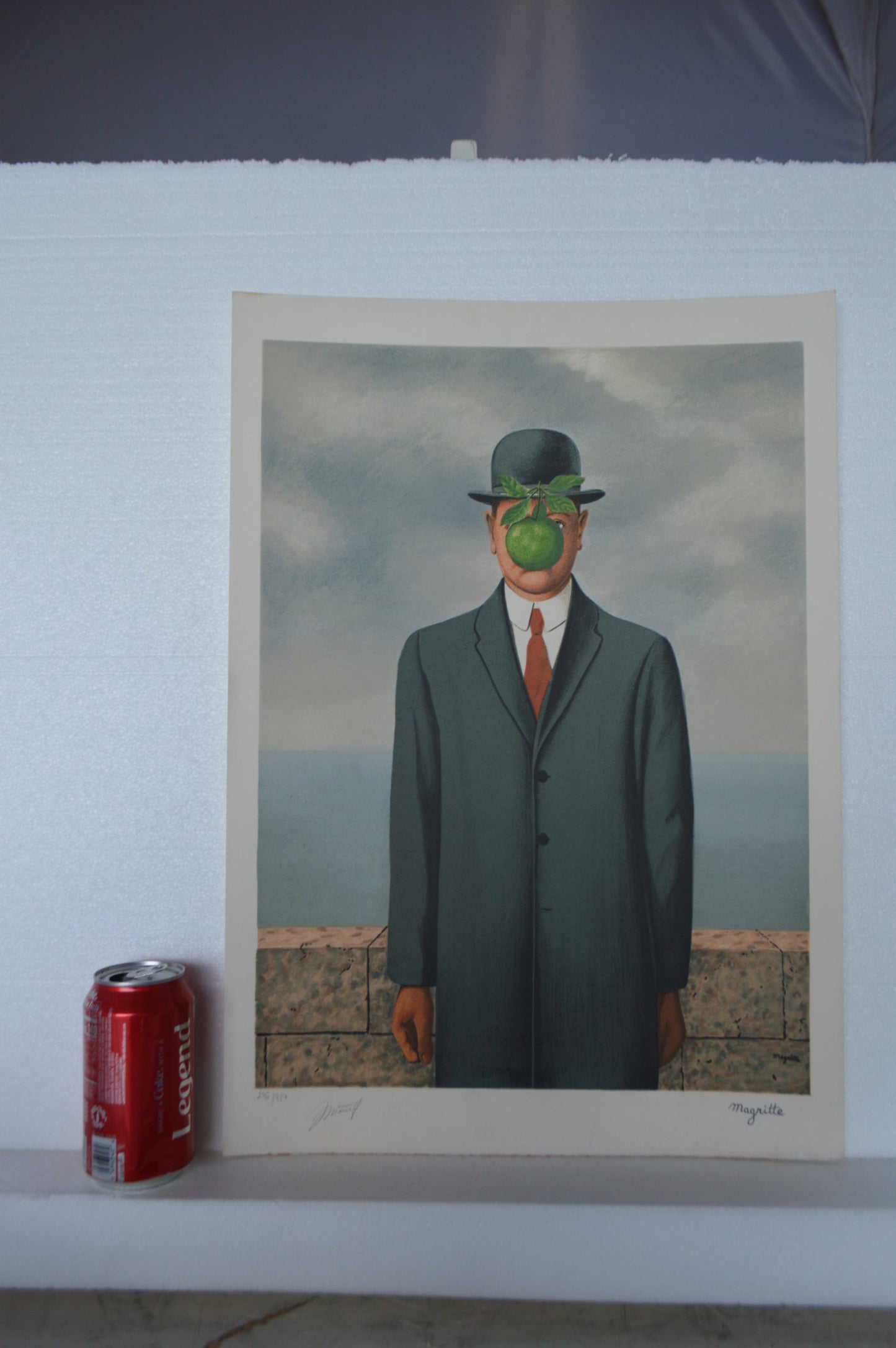 Son of Man by Magritte signed and sealed - Size: 14"L x 19"W