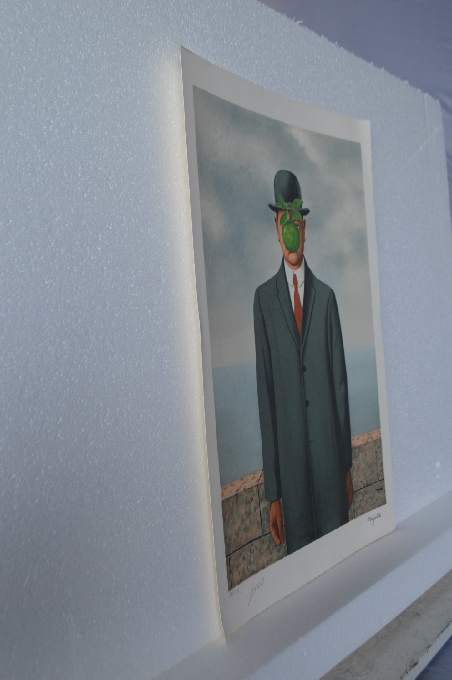 Son of Man by Magritte signed and sealed - Size: 14"L x 19"W