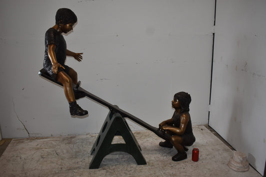 Playful Children on a See-Saw Bronze Statue Size: 76" x 27" x 59"H