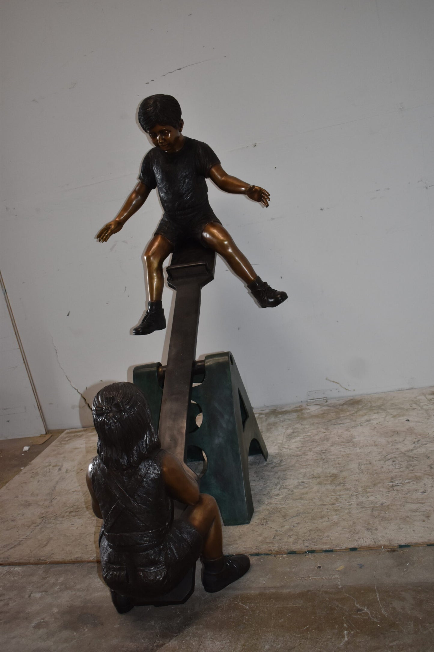 Playful Children on a See-Saw Bronze Statue Size: 76" x 27" x 59"H