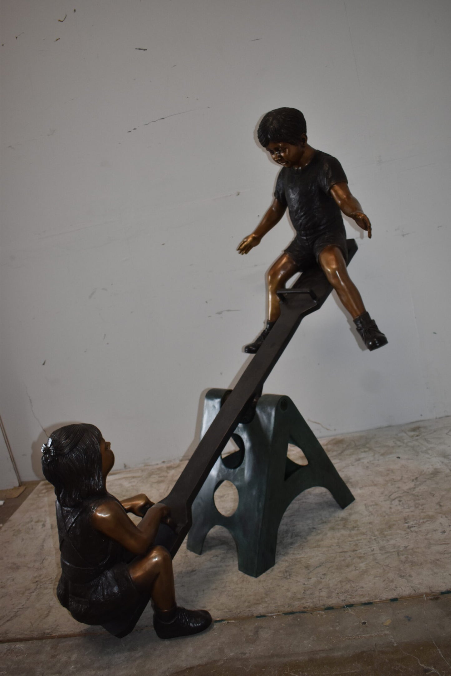 Playful Children on a See-Saw Bronze Statue Size: 76" x 27" x 59"H
