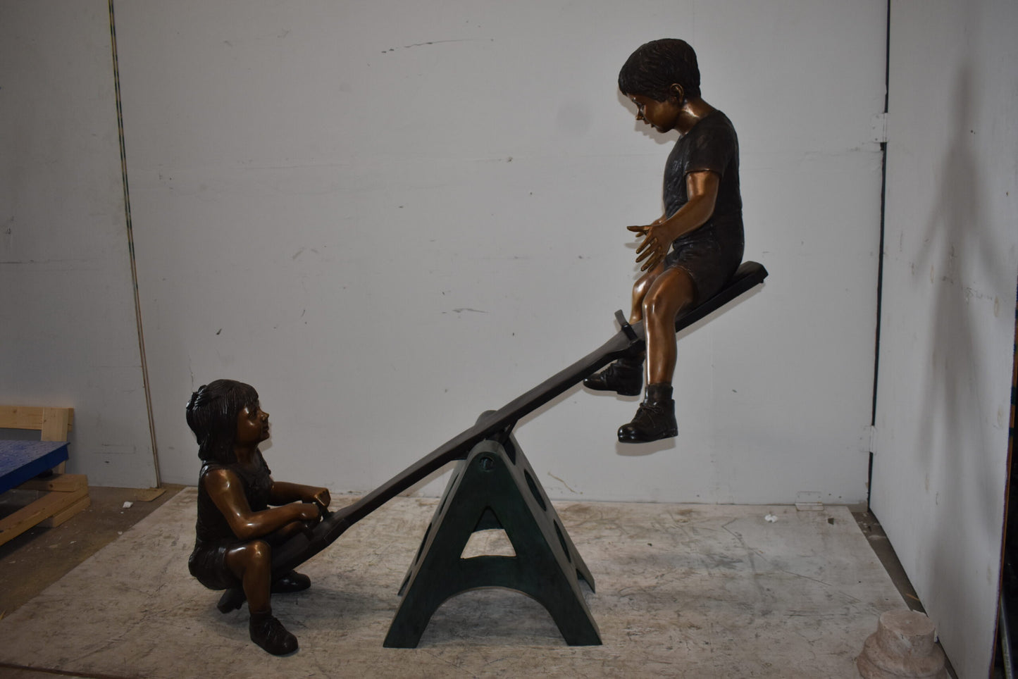 Playful Children on a See-Saw Bronze Statue Size: 76" x 27" x 59"H