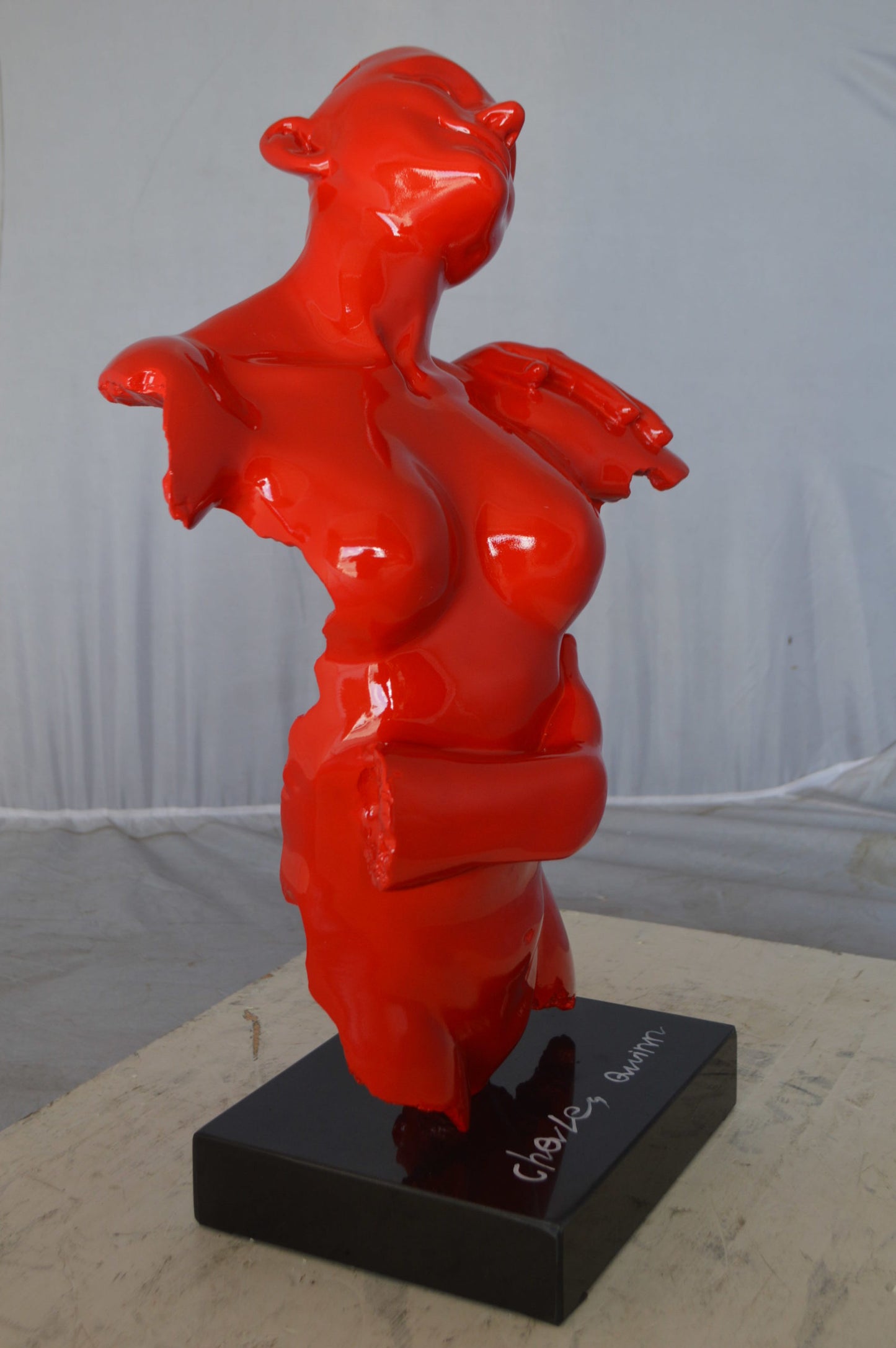 Modern resin statue of a woman hugged by a men - Size: 13"L x 9"W x 24"H.