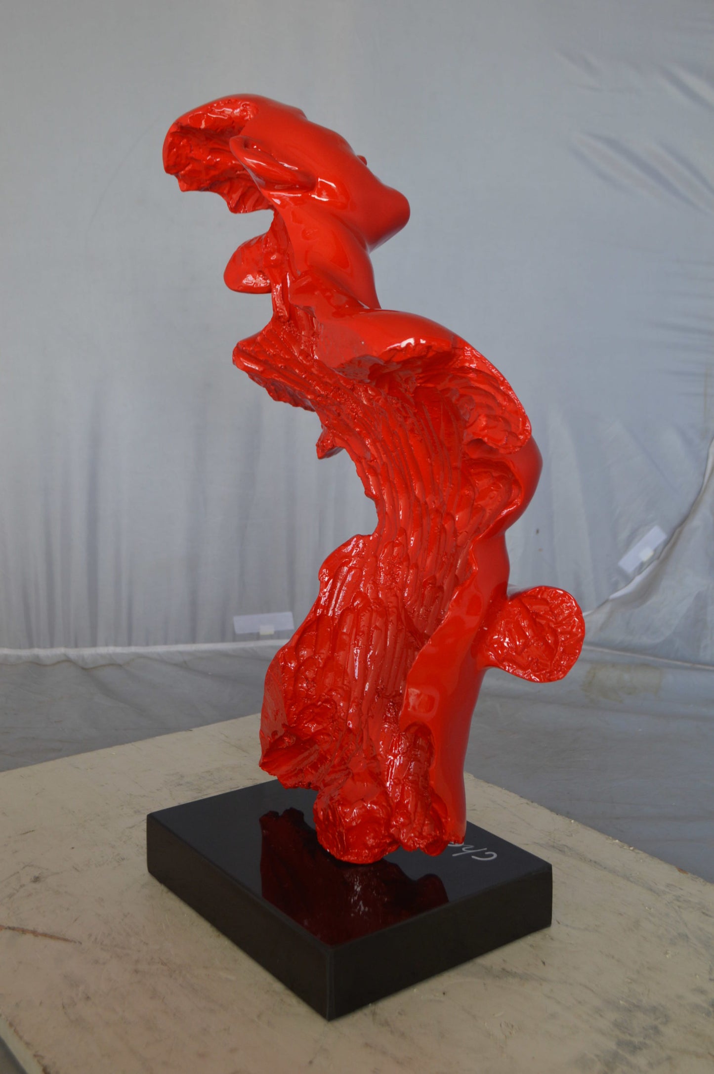 Modern resin statue of a woman hugged by a men - Size: 13"L x 9"W x 24"H.