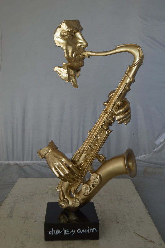 Modern art of a saxophone player resin statue -  Size: 13"L x 5"W x 25"H.