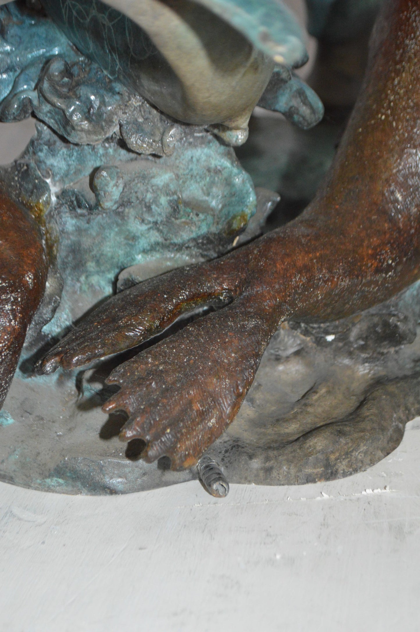Girl feeding a dolphin and seals bronze fountain - Size: 28"L x 17"W x 37"H.