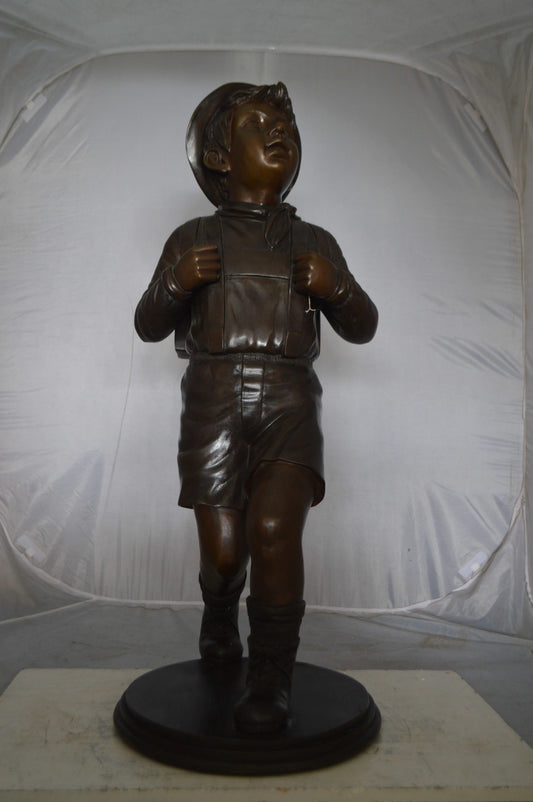 Boy with backpack bronze statue - Size: 20"L x 18"W x 46"H.