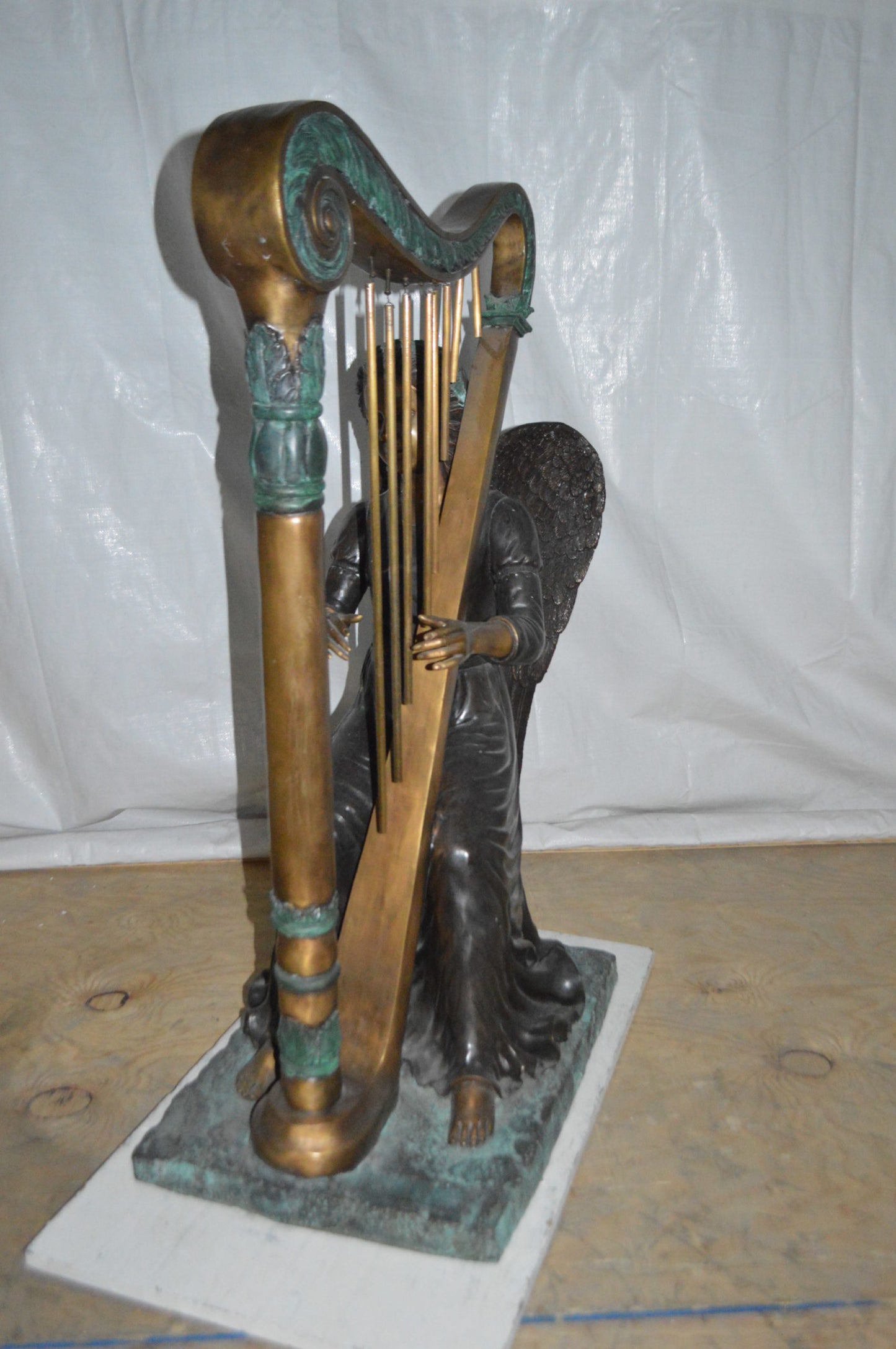 Angel playing a harp bronze statue - Size: 30"L x 15"W x 44"H.