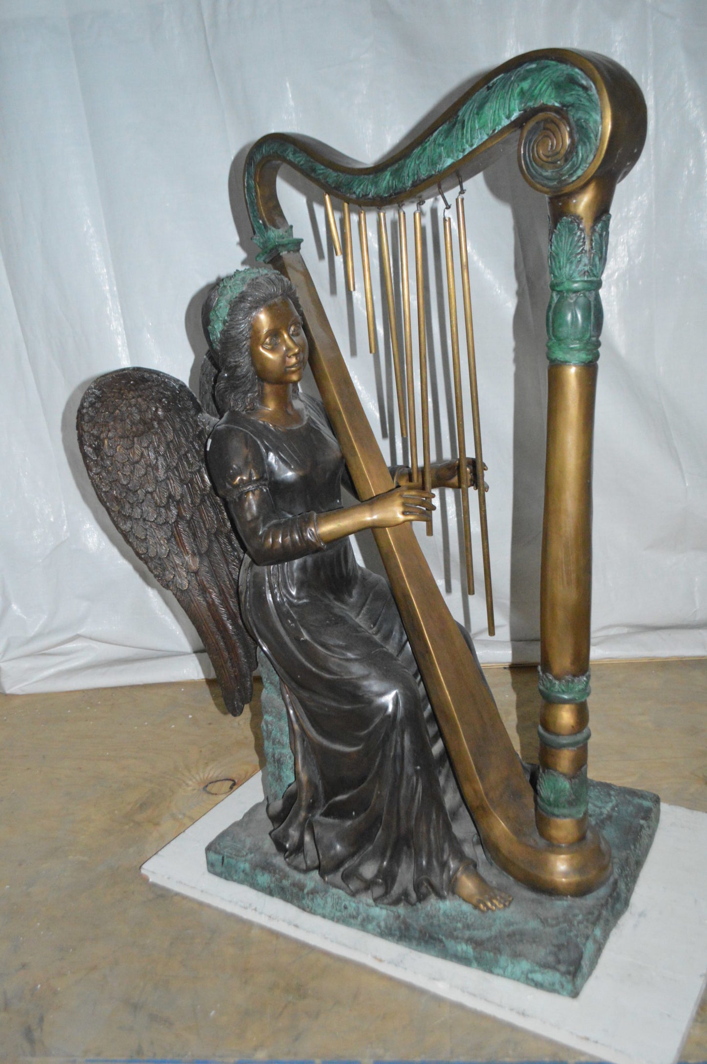 Angel playing a harp bronze statue - Size: 30"L x 15"W x 44"H.