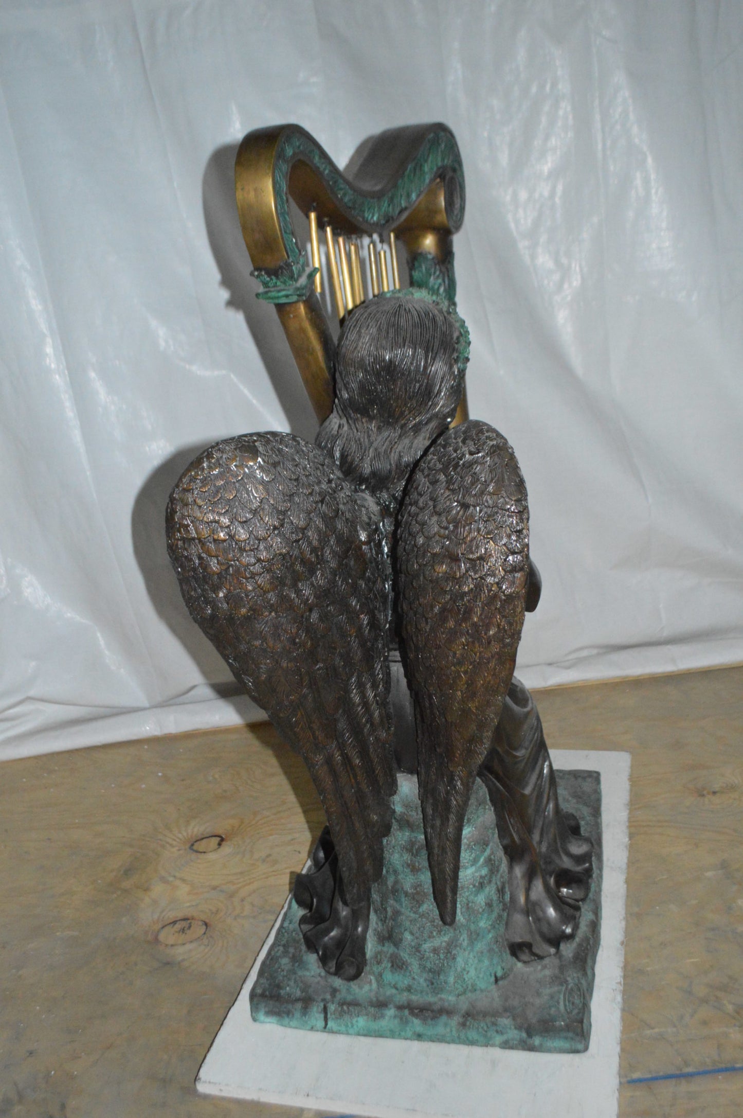 Angel playing a harp bronze statue - Size: 30"L x 15"W x 44"H.