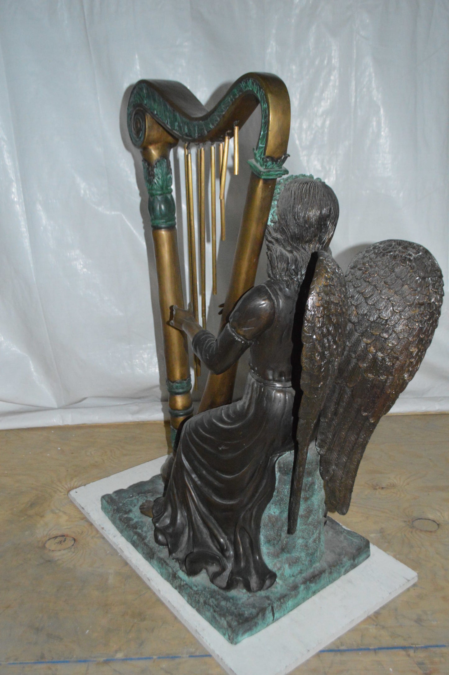 Angel playing a harp bronze statue - Size: 30"L x 15"W x 44"H.