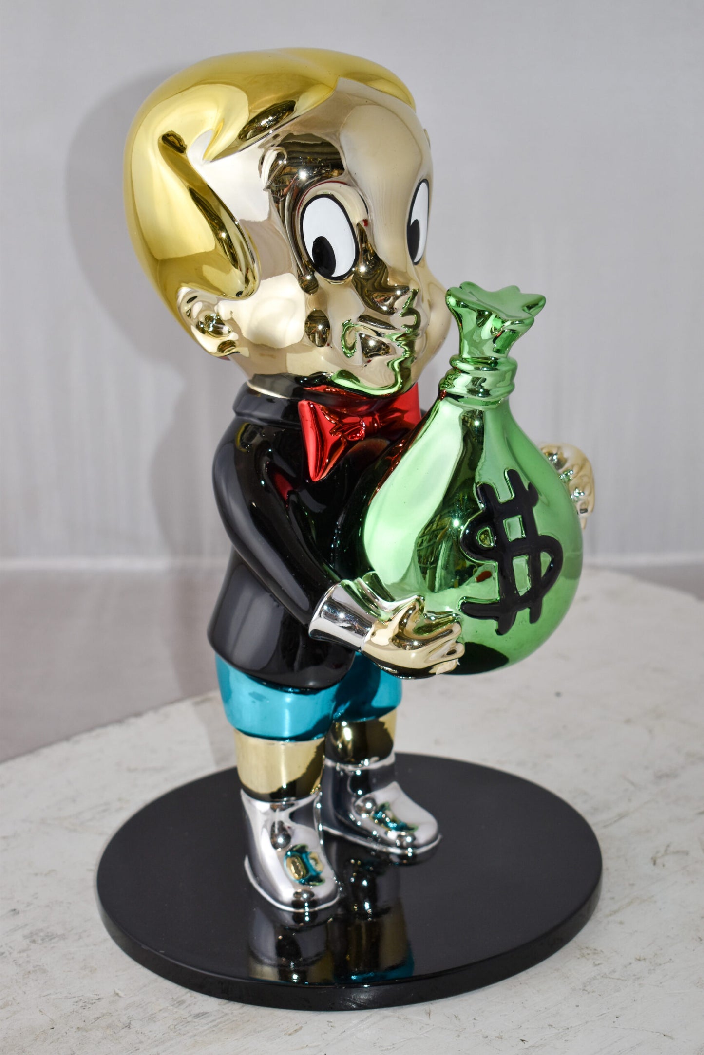 Monopoly Child Holding Money Bag Resin Statue Small Size: 1" x 10" x 15"H