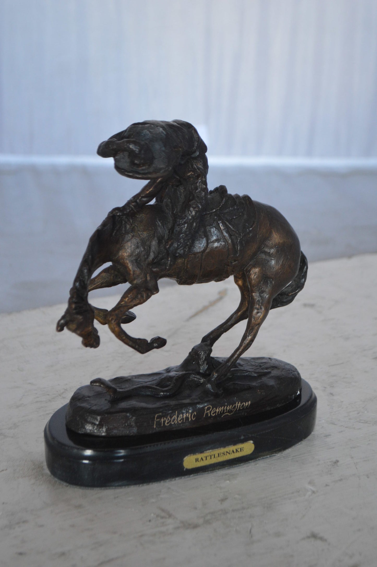 Rattlesnake by Remington Bronze Statue 12H -  Size: 7"L x 3"W x 10"H.