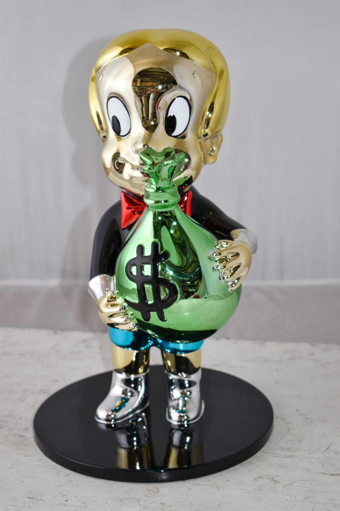 Monopoly Child Holding Money Bag Resin Statue Small Size: 1" x 10" x 15"H