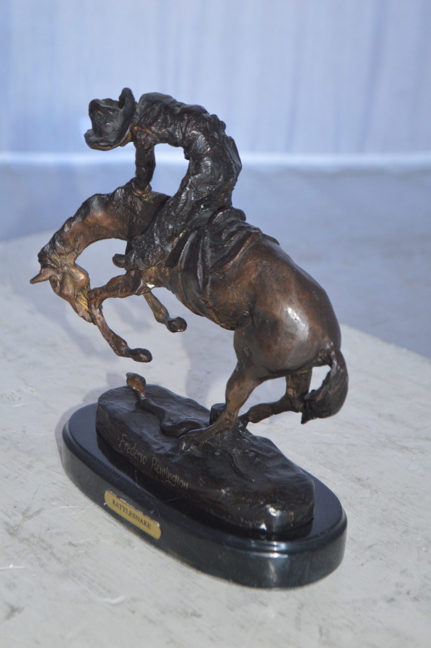 Rattlesnake by Remington Bronze Statue 12H -  Size: 7"L x 3"W x 10"H.