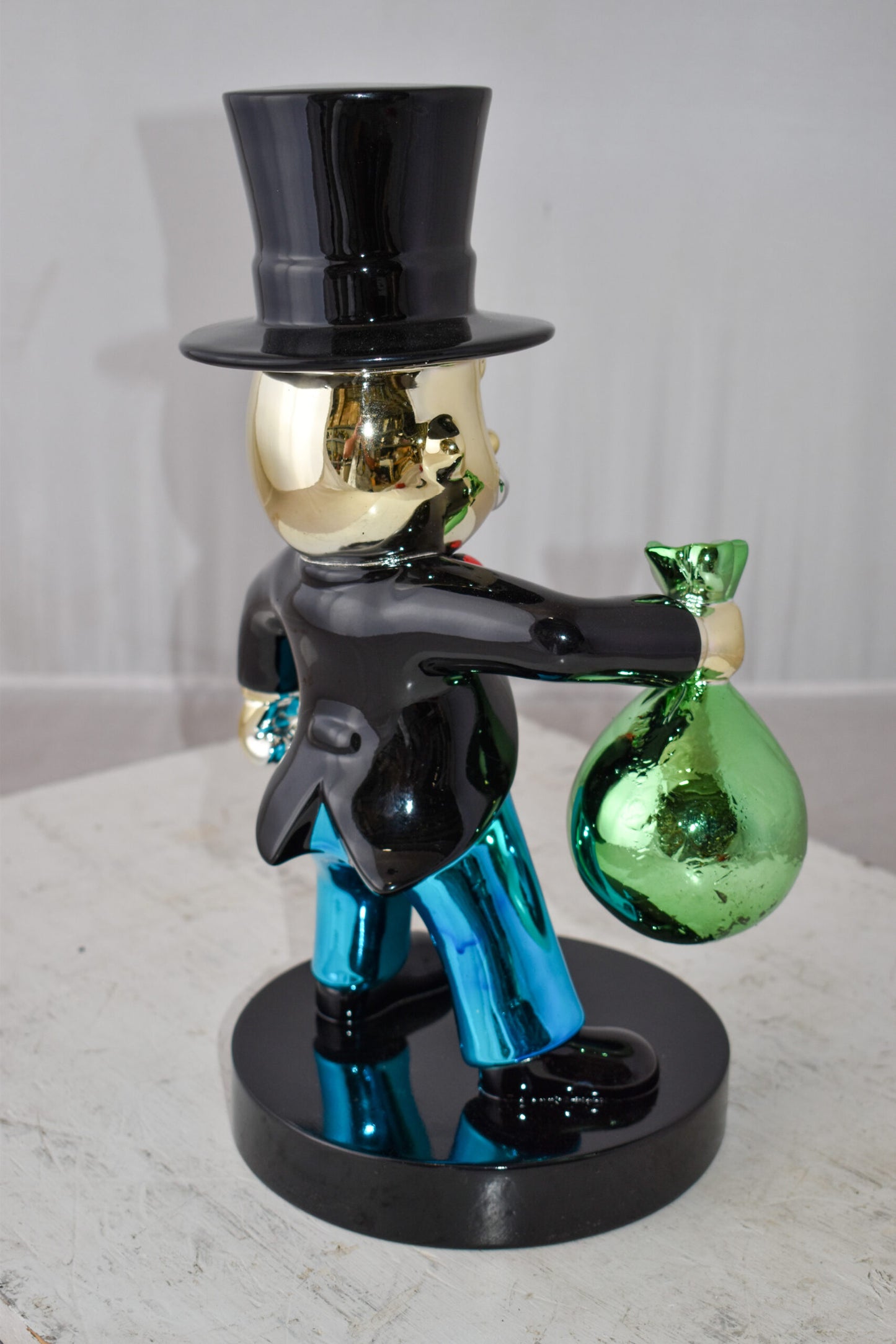 Frowning Monopoly Man Holding Money Bag Resin Statue Small Size: 7" x 8" x 15"H