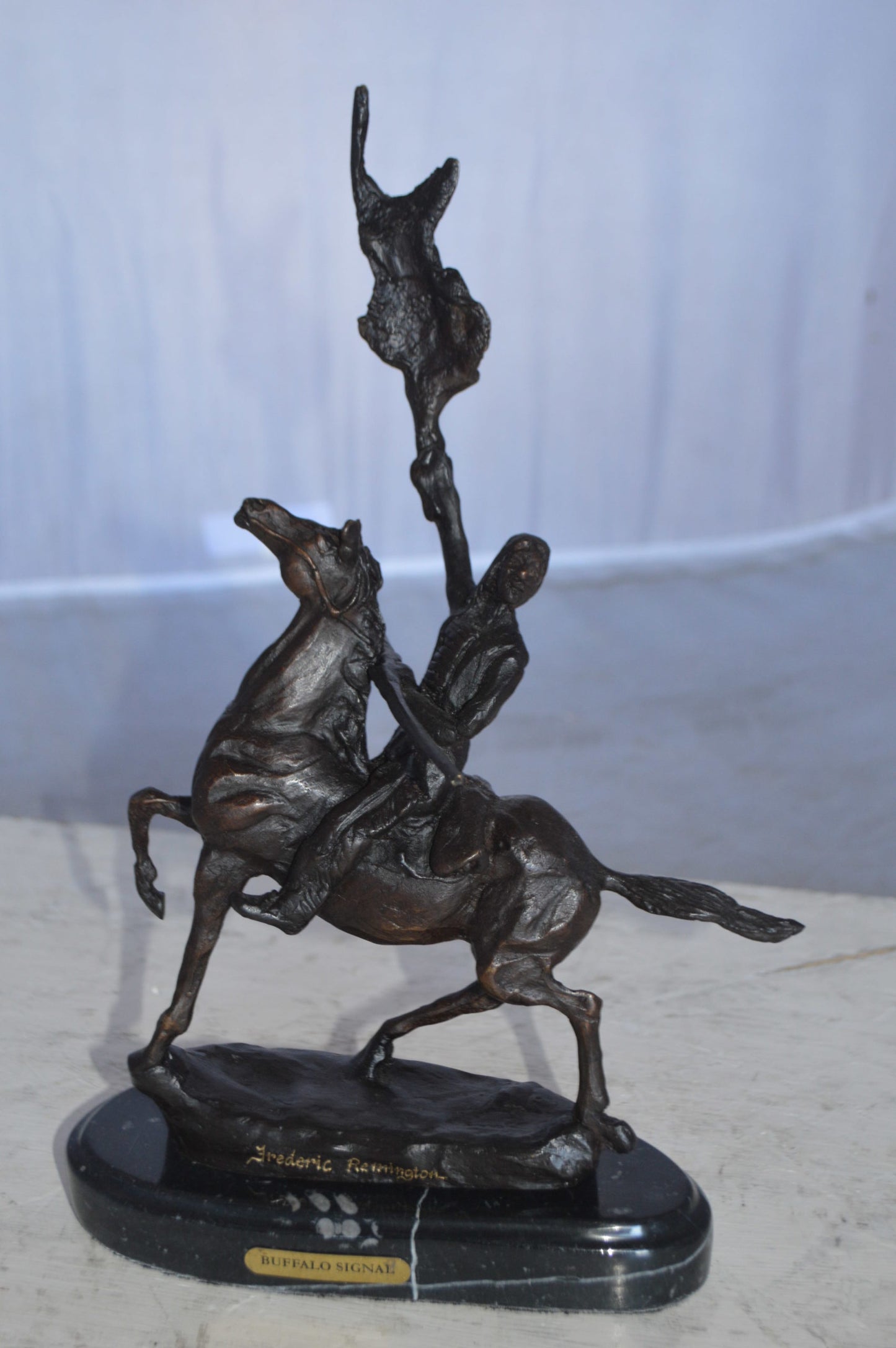 Buffalo Signal Bronze Statue by Remington 13H - Size: 8"L x 3"W x 13"H.