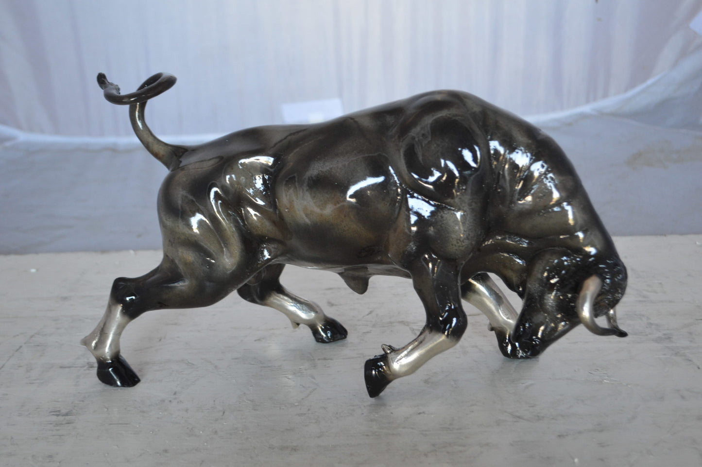 Charging Bull Bronze Statue -  Size: 15"L x 5"W x 8"H.