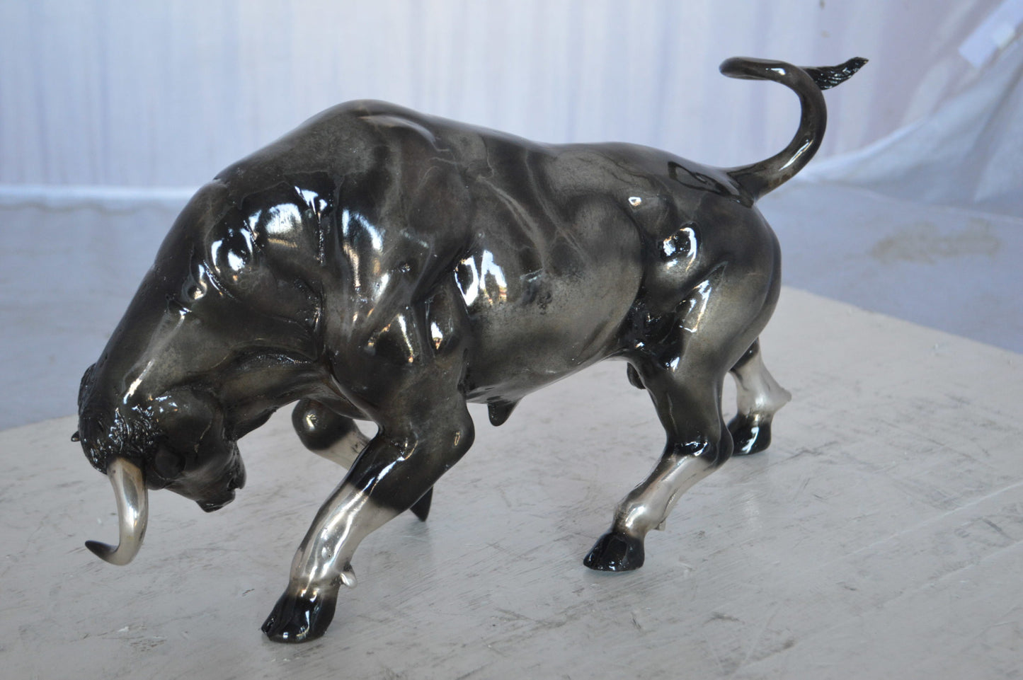 Charging Bull Bronze Statue -  Size: 15"L x 5"W x 8"H.