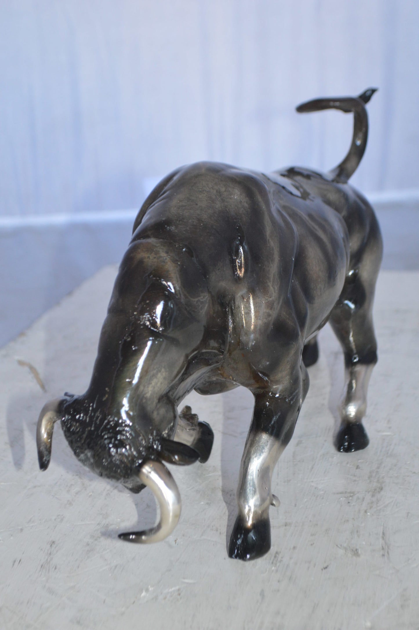 Charging Bull Bronze Statue -  Size: 15"L x 5"W x 8"H.