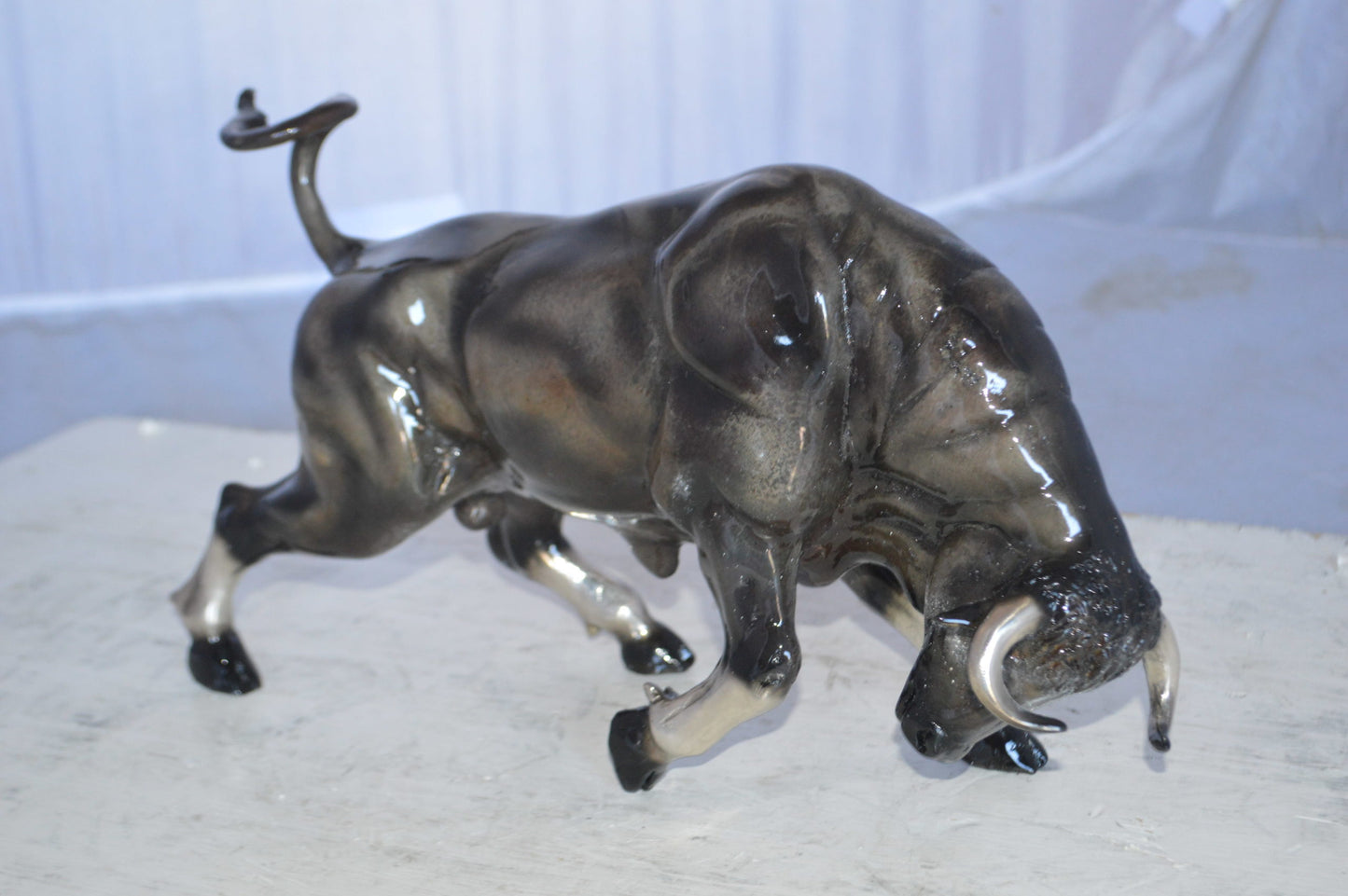 Charging Bull Bronze Statue -  Size: 15"L x 5"W x 8"H.