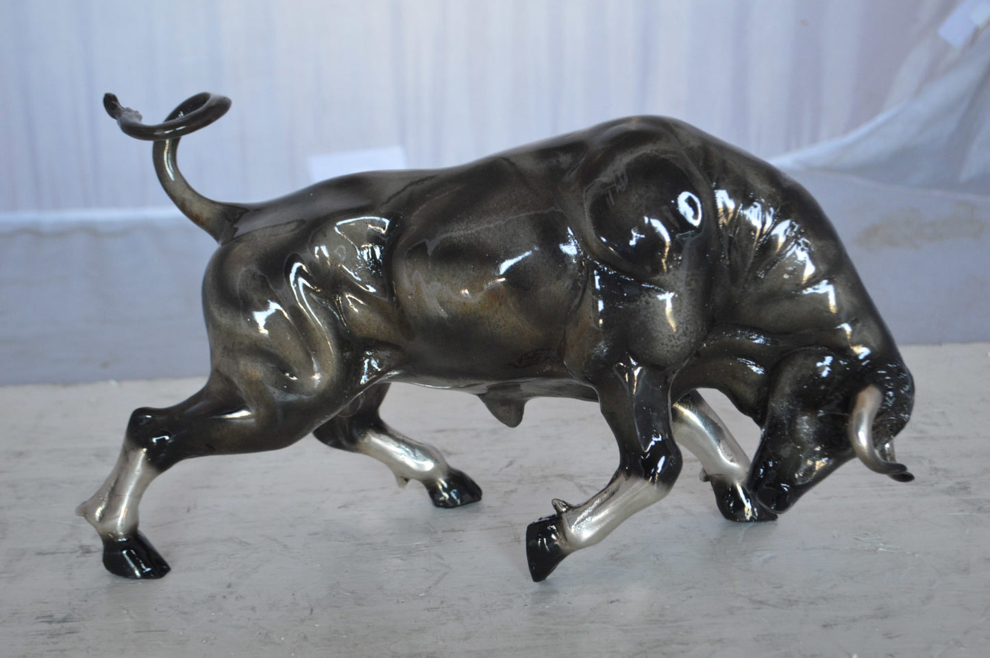 Charging Bull Bronze Statue -  Size: 15"L x 5"W x 8"H.