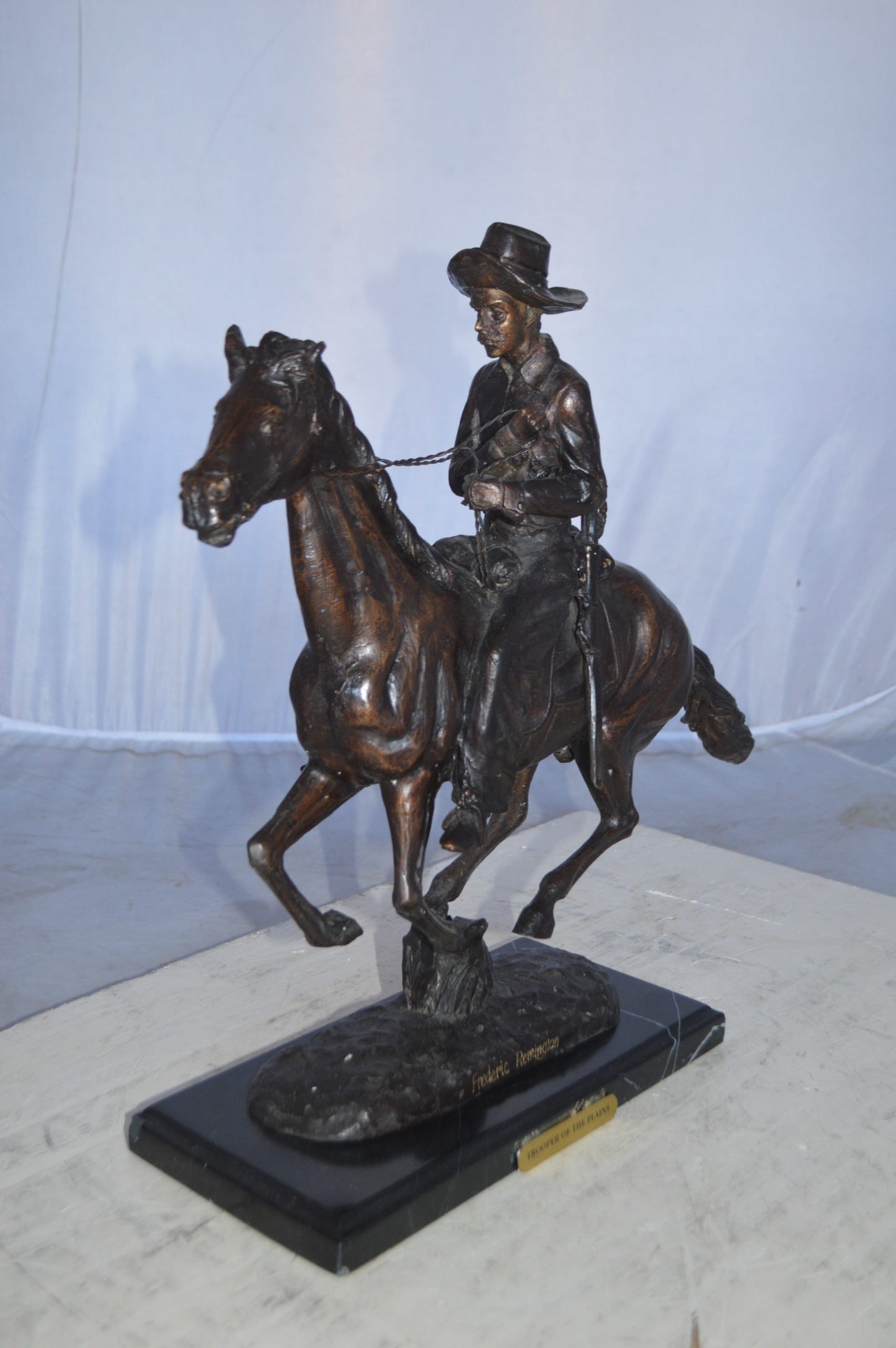 Trooper of the plains Bronze replica by Remington - Size: 17"L x 6"W x 18"H.