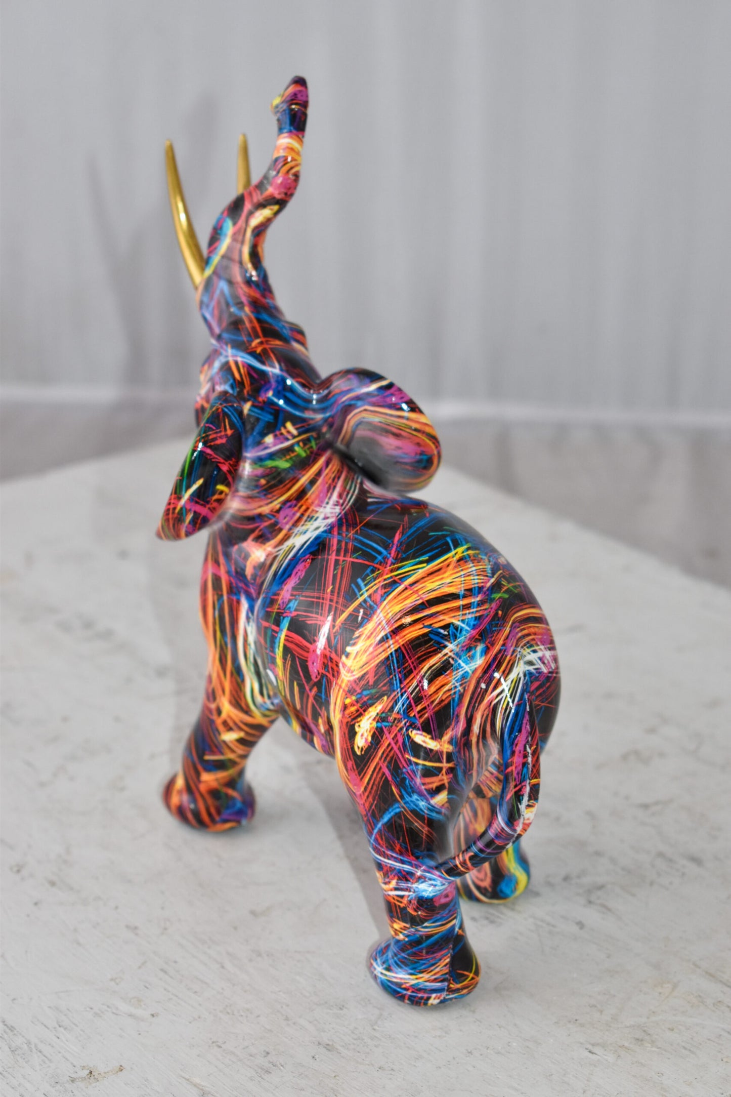 Elephant With His Trunk Up Colored Modern Resin Statue Size: 8" x 4" x 10"H