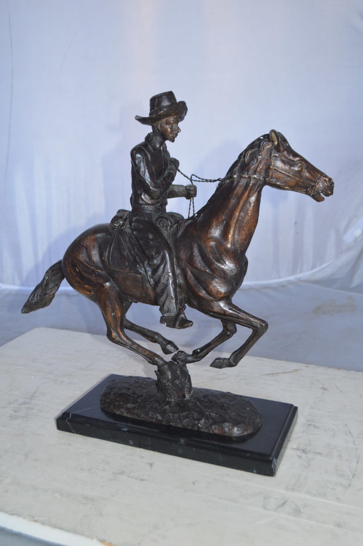 Trooper of the plains Bronze replica by Remington - Size: 17"L x 6"W x 18"H.