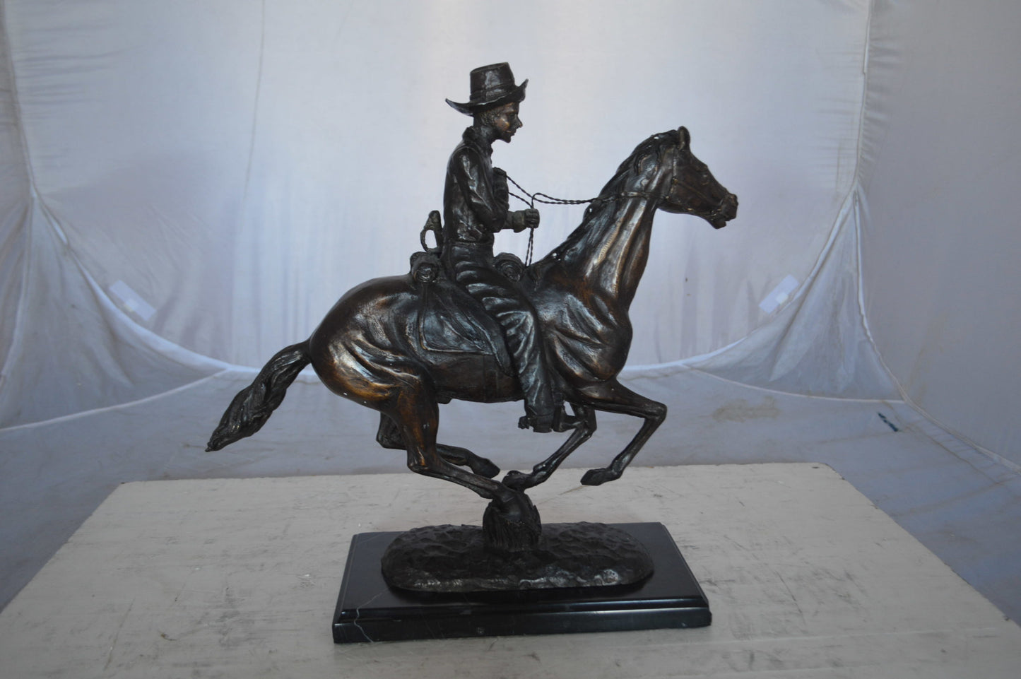 Trooper of the plains Bronze replica by Remington - Size: 17"L x 6"W x 18"H.